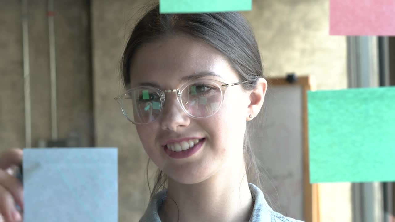 Stock Video Face Of A Woman Writing Ideas On Sticky Notes Live Wallpaper For PC