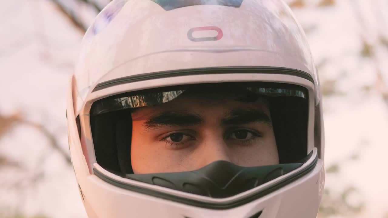 Stock Video Face Of A Motorcycle Rider With A Helmet Putting On Live Wallpaper For PC