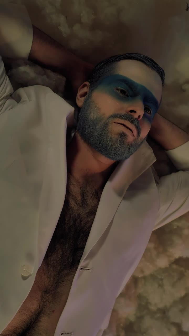 Stock Video Face Of A Man With Winter Makeup Lying Down Live Wallpaper For PC