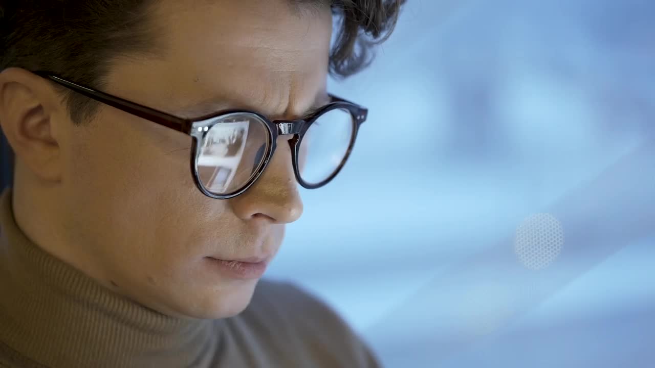 Stock Video Face Of A Man With Glasses Using A Tablet Live Wallpaper For PC