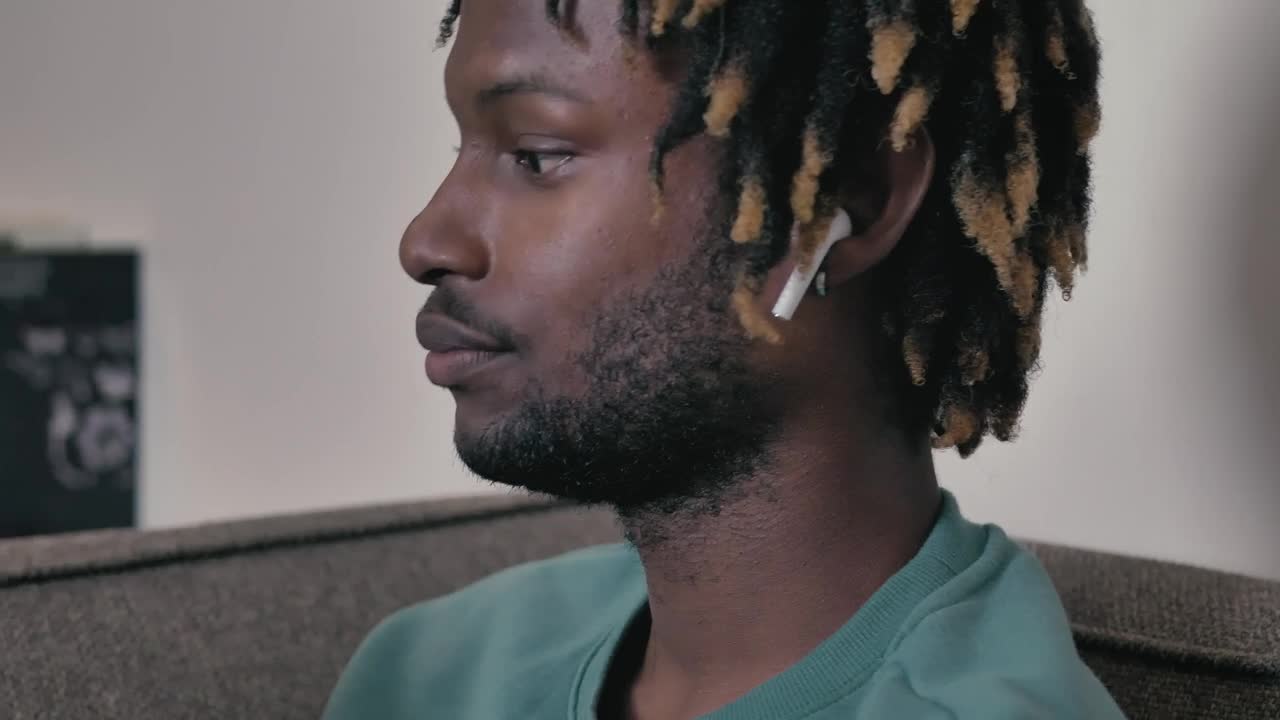 Stock Video Face Of A Man Listening To Music While Reading A Live Wallpaper For PC