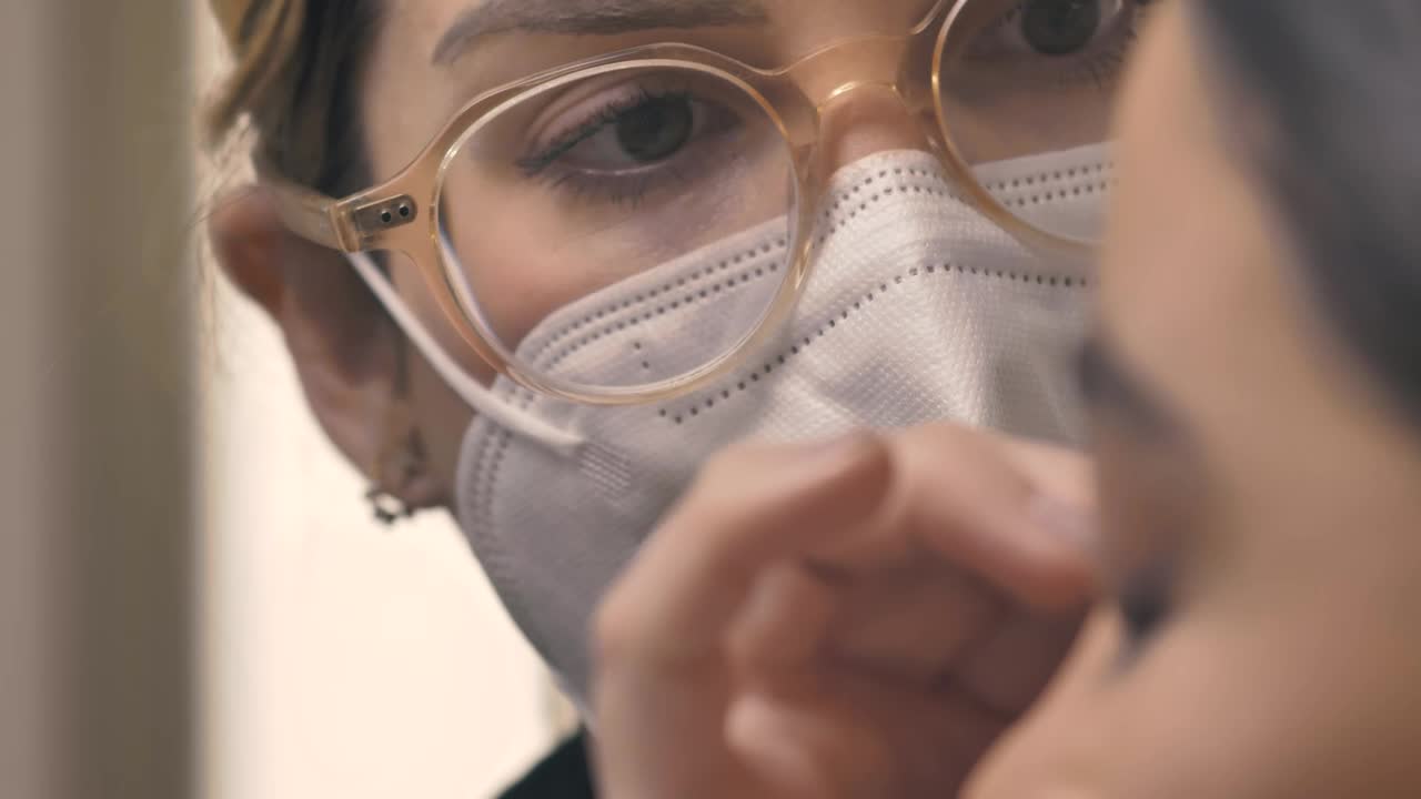 Stock Video Face Of A Makeup Artist With A Mask Working Live Wallpaper For PC