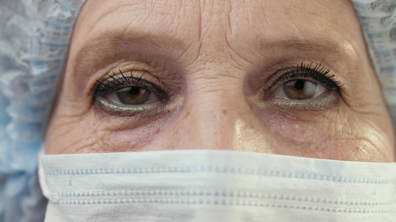 Stock Video Eyes Of A Doctor Or Nurse With A Mask Live Wallpaper For PC