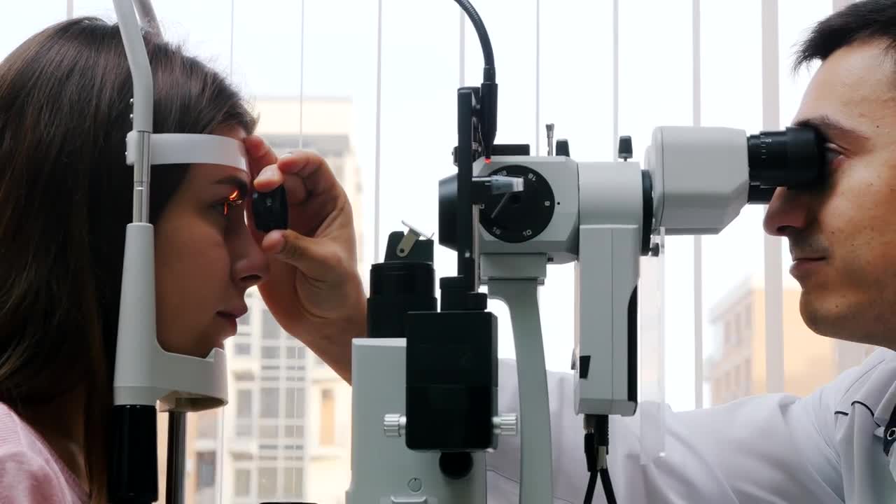 Stock Video Eye Exam With An Ophthalmologist And A Patient Live Wallpaper For PC