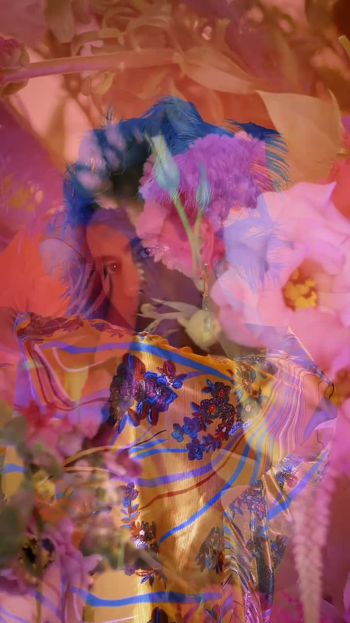 Stock Video Extravagant Gay Boy In Abstract Video With Flowers Live Wallpaper For PC