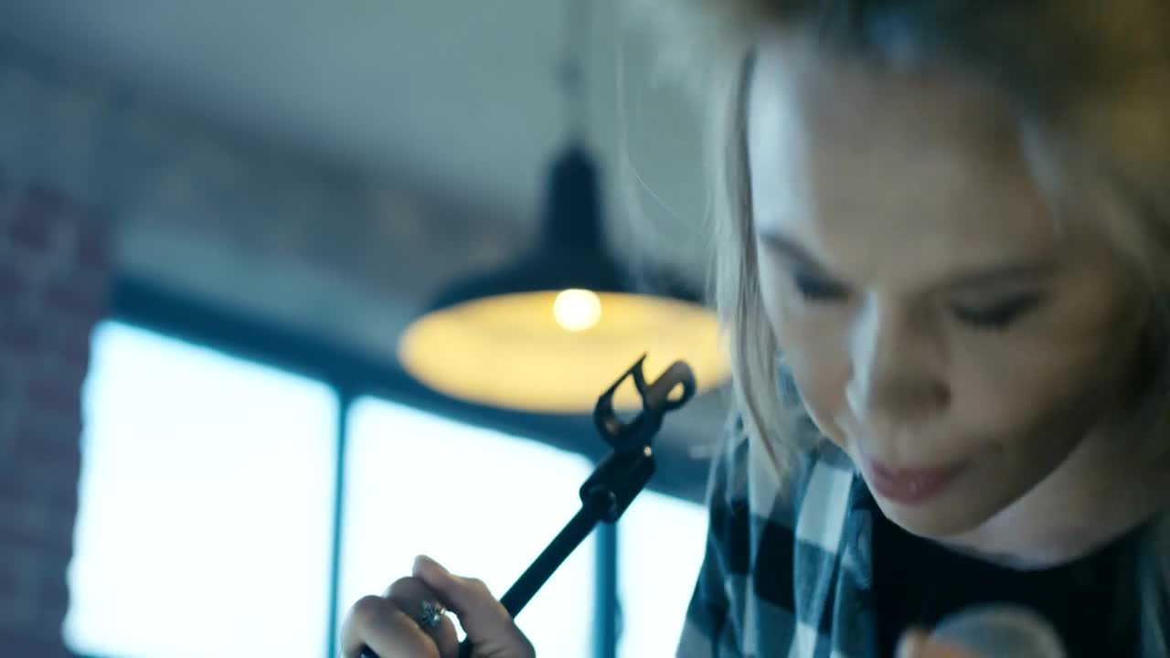 Stock Video Expressive Blonde Girl Singing With Microphone Live Wallpaper For PC