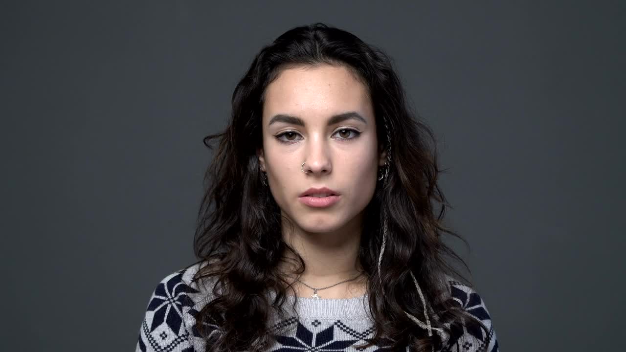 Stock Video Expressionless Woman Looking At The Camera Live Wallpaper For PC