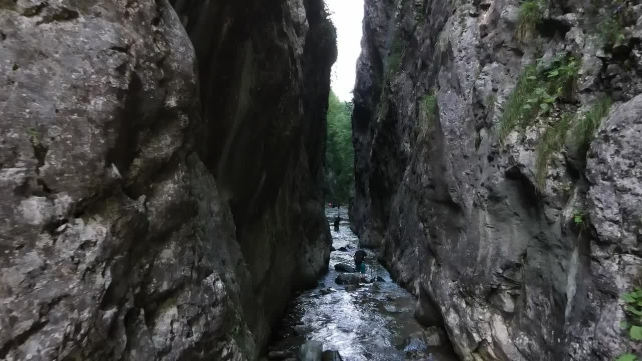 Stock Video Explorers Crossing A River Between Two Mountains Live Wallpaper For PC