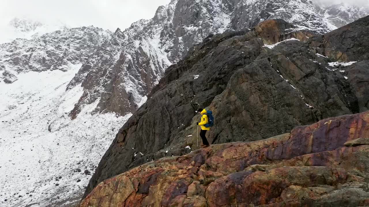 Stock Video Explorer Walking On Top Of A Mountain Live Wallpaper For PC