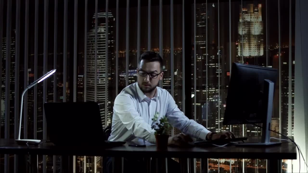 Stock Video Excited Man In The Office At Night Live Wallpaper For PC