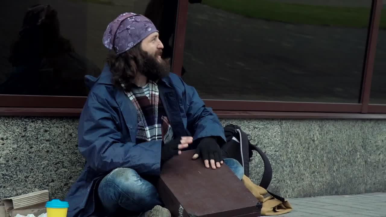 Stock Video Excited Happy Homeless Is Drumming On A Briefcase Live Wallpaper For PC