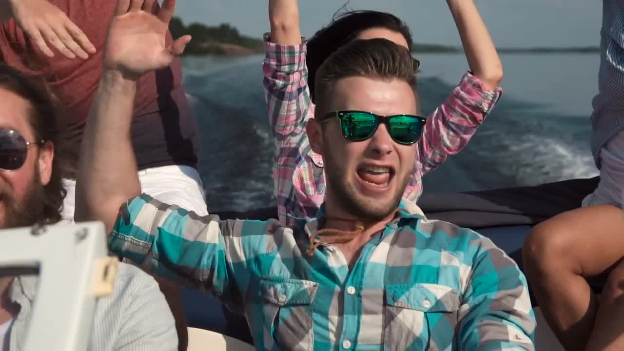 Stock Video Excited Friends Sailing On A Speed Boat Live Wallpaper For PC