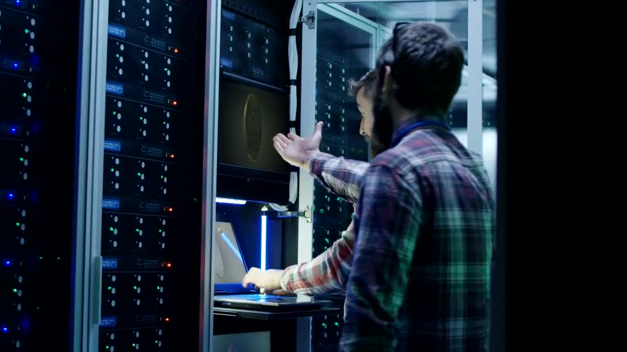 Stock Video Excited Engineers In Bitcoin Mining Farm Live Wallpaper For PC