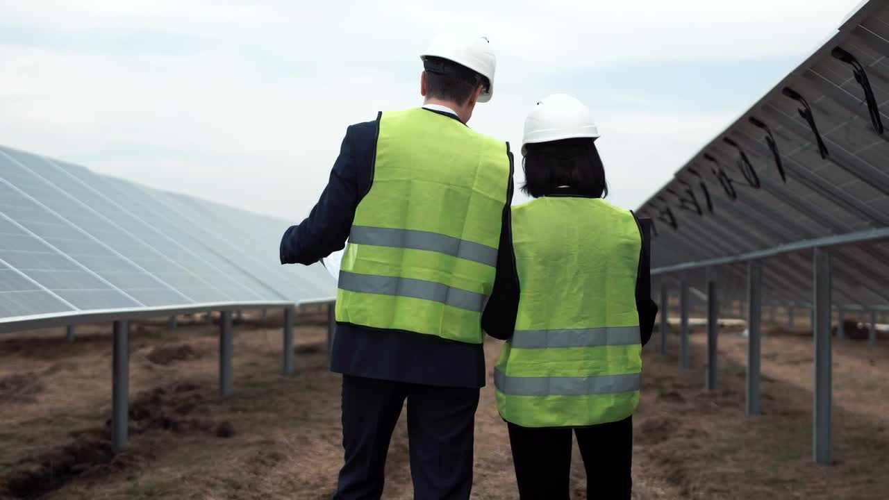 Stock Video Engineers Working Through Solar Field Live Wallpaper For PC