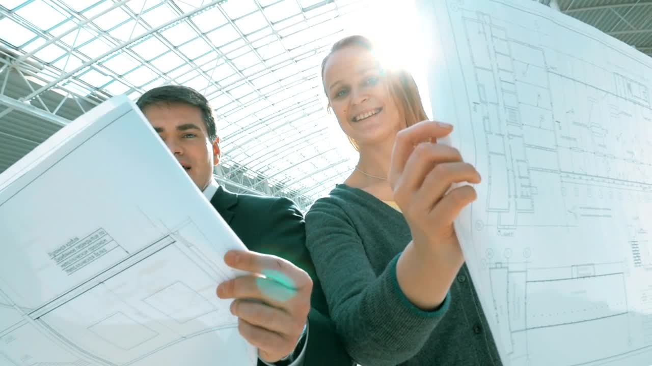 Stock Video Engineers Looking At Blueprints Live Wallpaper For PC