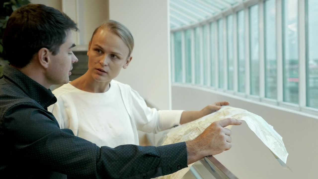 Stock Video Engineers Looking At A Layout Live Wallpaper For PC