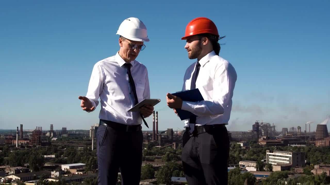Stock Video Engineers Discussing Project Outdoors Live Wallpaper For PC