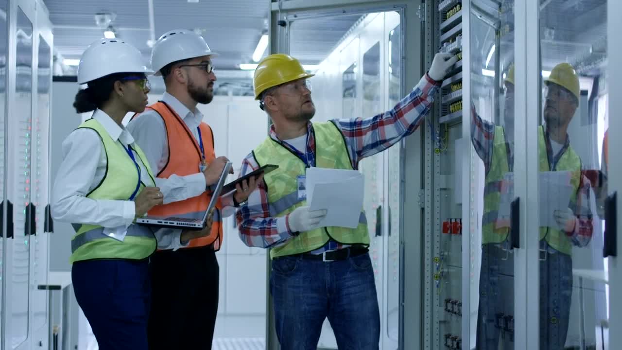 Stock Video Engineers Checking Equipment Data Live Wallpaper For PC