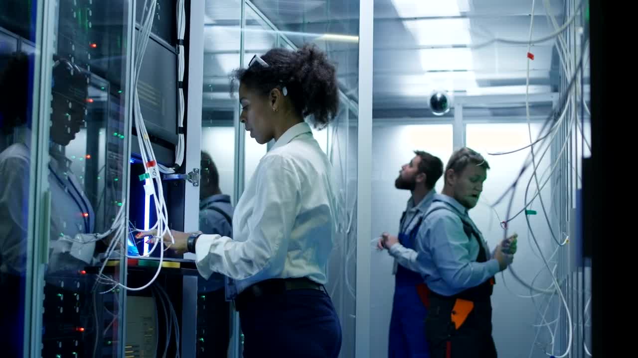 Stock Video Engineer Team Working In A Server Room Live Wallpaper For PC