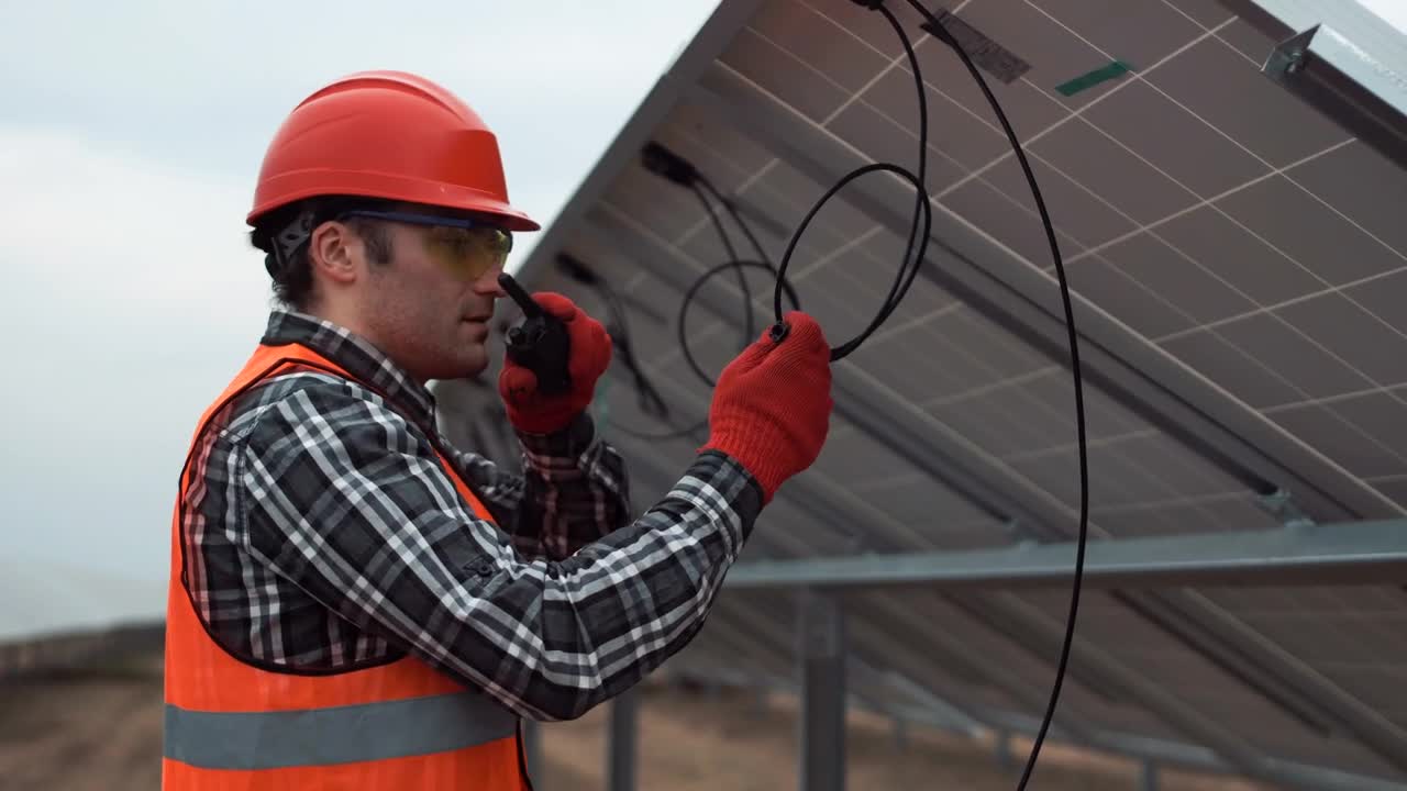 Stock Video Engineer Installing Solar Panels Live Wallpaper For PC