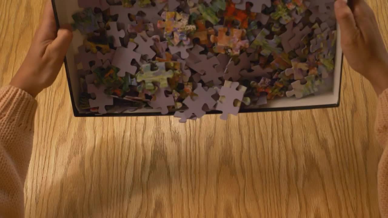 Stock Video Emptying A Box With Puzzle Pieces Live Wallpaper For PC
