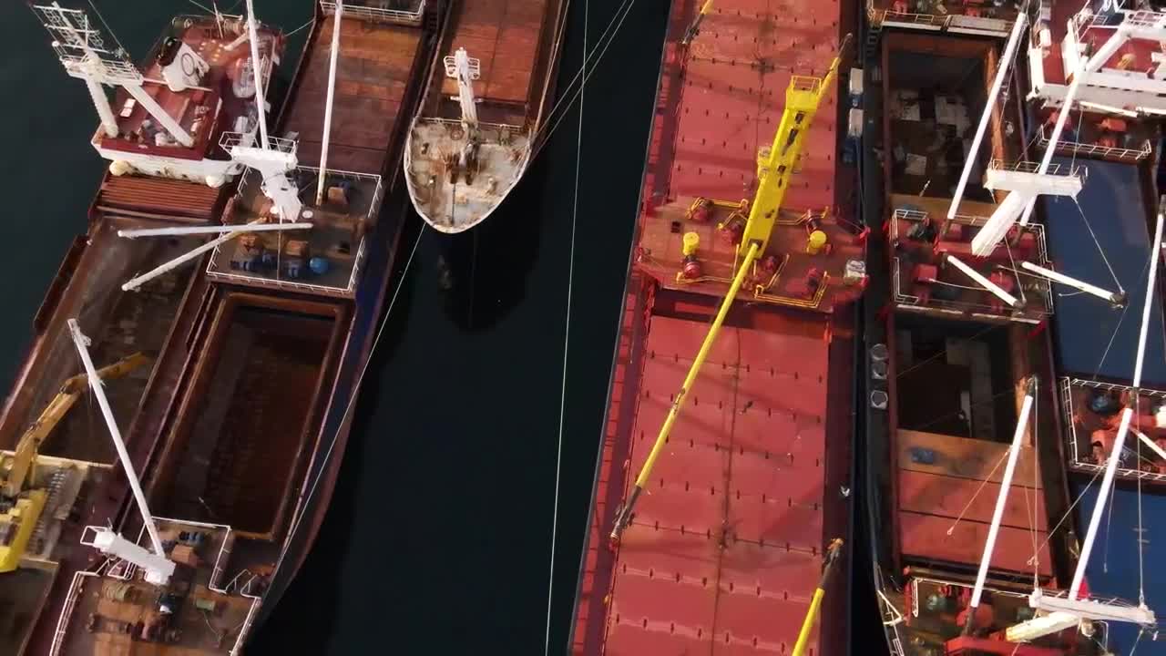 Stock Video Empty Cargo Ships Lined Up On A Coast From The Live Wallpaper For PC