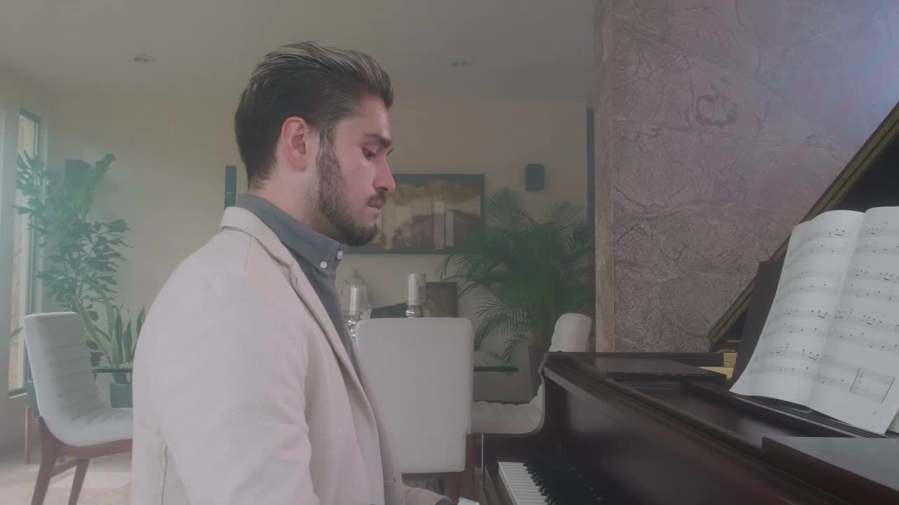 Stock Video Elegant Man Playing The Piano In A Luxurious Home Live Wallpaper For PC