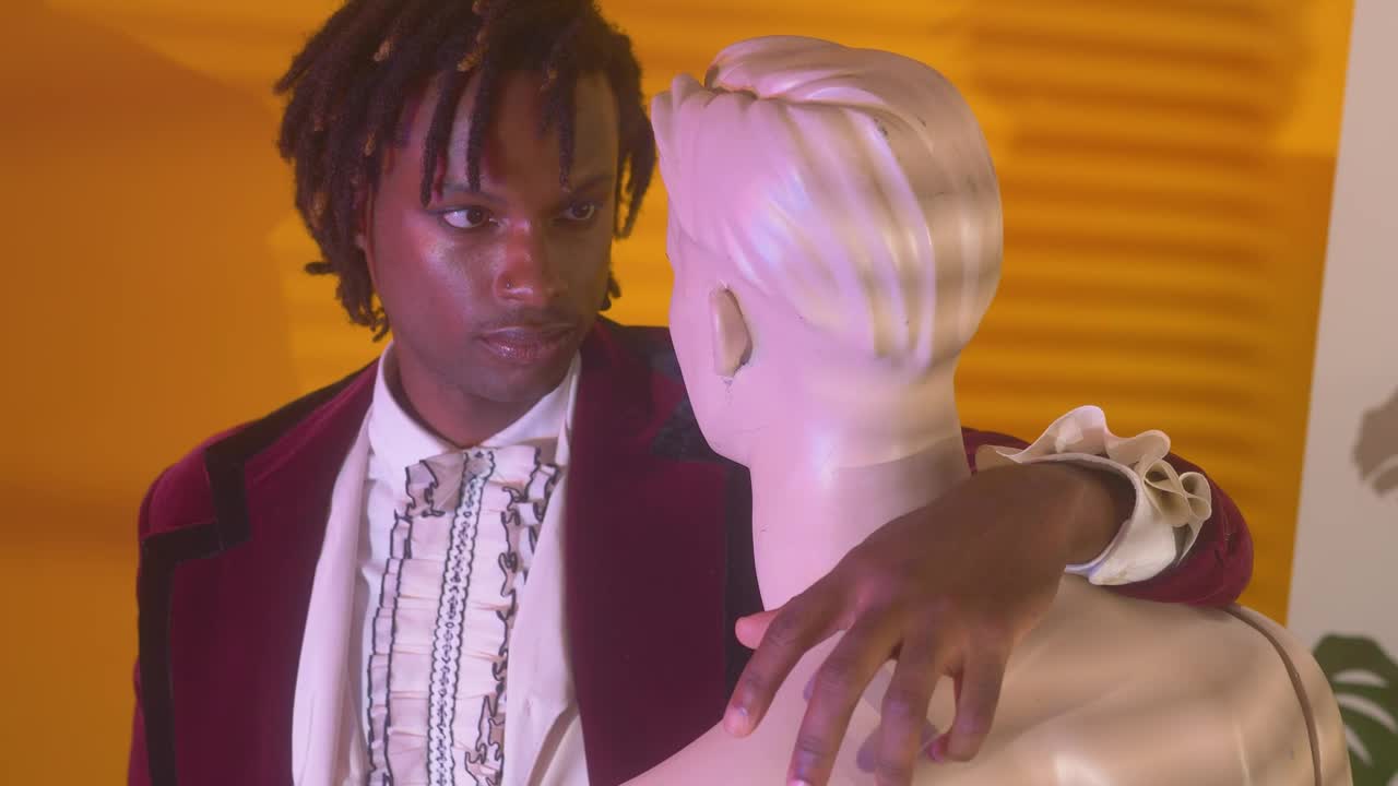 Stock Video Elegant Man Hugging And Staring At A Mannequin Live Wallpaper For PC