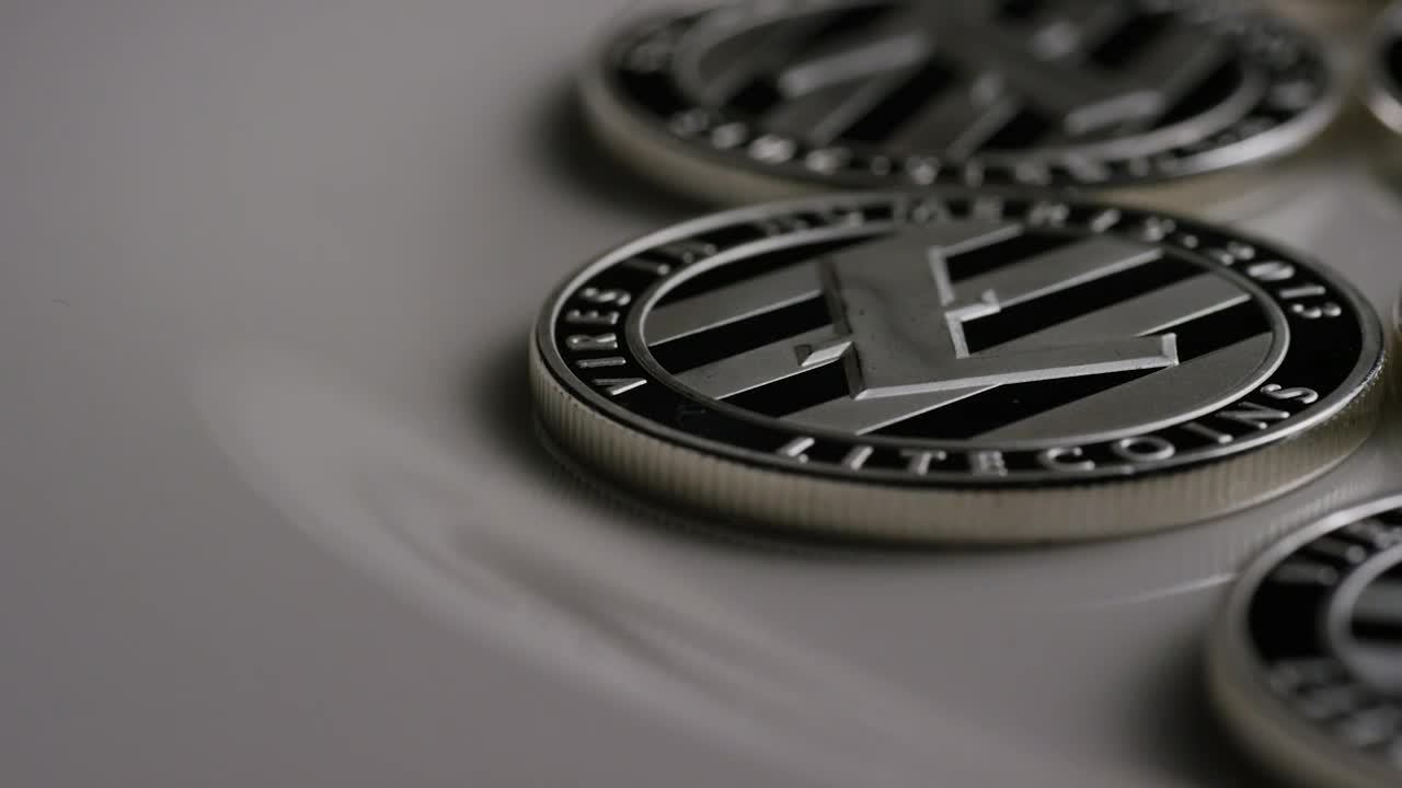 Stock Video Elegant Litecoin Coins Slowly Rotating Live Wallpaper For PC