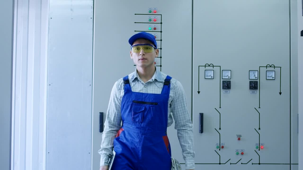 Stock Video Electrical Power Plant Worker In The Hallway Live Wallpaper For PC