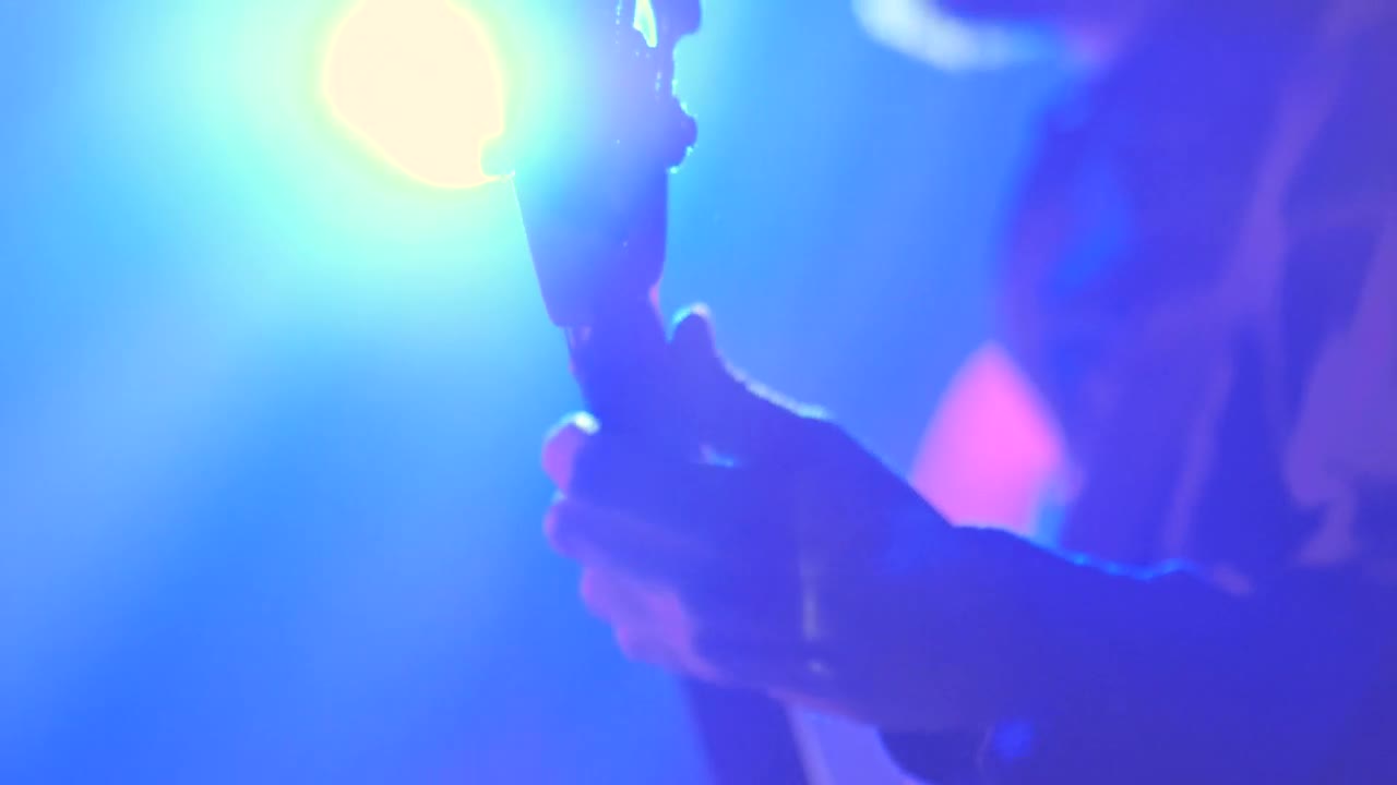 Stock Video Electric Guitar Played Under The Spotlight Live Wallpaper For PC