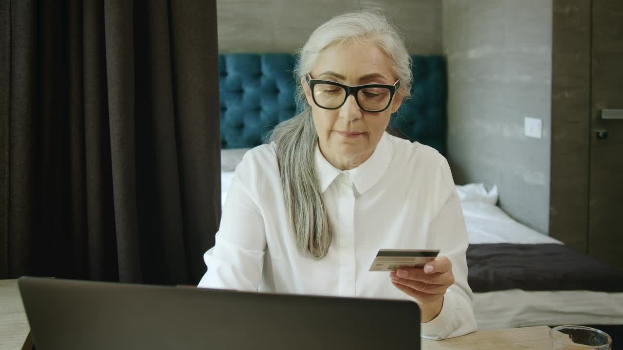 Stock Video Elderly Woman Online Shopping Uses Credit Card Payment Live Wallpaper For PC