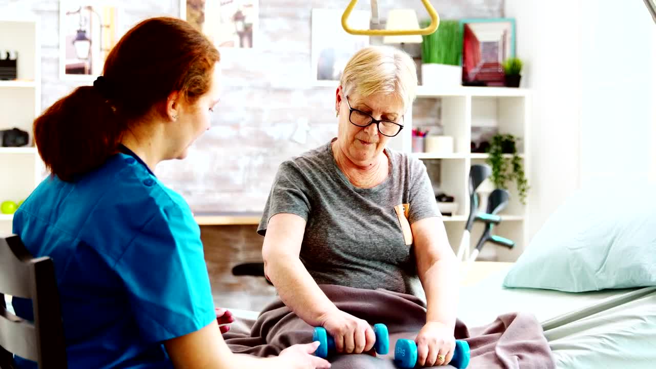 Stock Video Elderly Woman In Physical Therapy With Nurse Live Wallpaper For PC