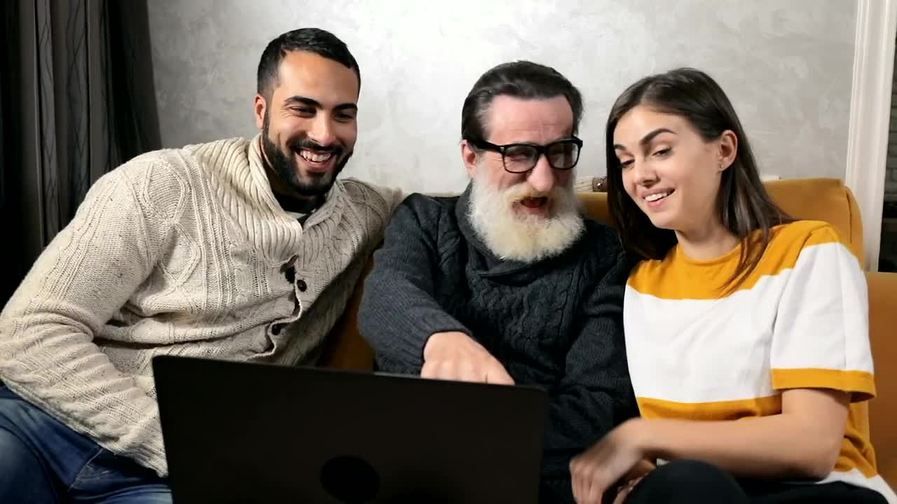 Stock Video Elderly Man Tells Grandchildren A Joke He Read On Web Live Wallpaper For PC