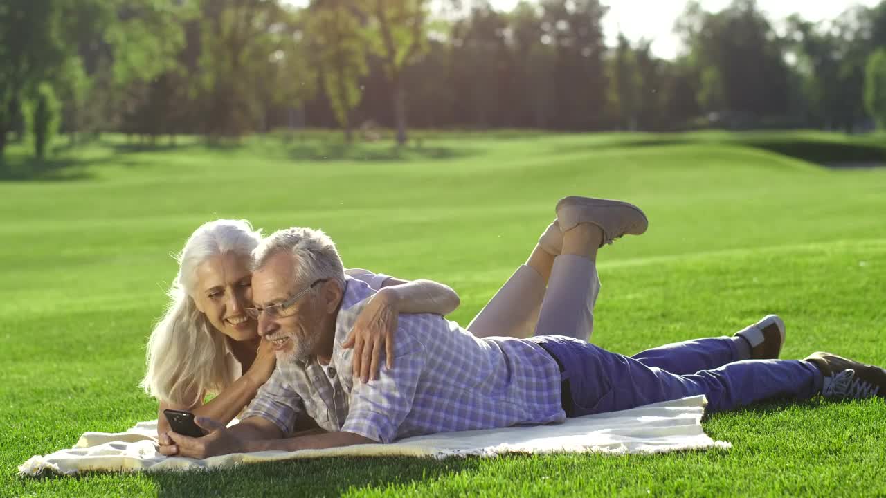 Stock Video Elderly Couple Using A Phone Outside Live Wallpaper For PC