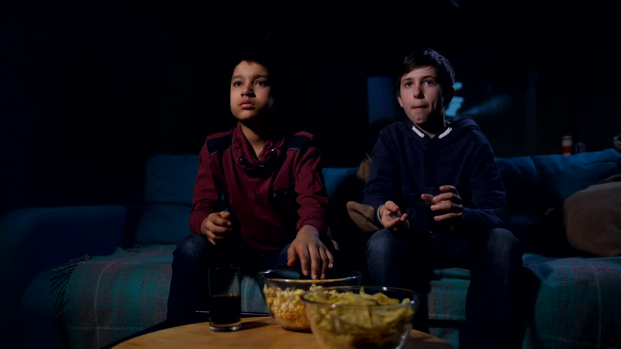 Stock Video Eating Popcorn While Watching A Horror Film Live Wallpaper For PC