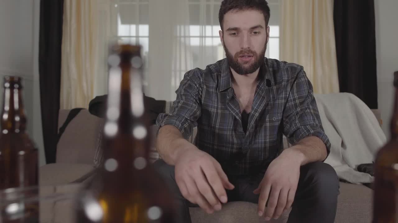 Stock Video Drunk Young Man Watching Television Live Wallpaper For PC