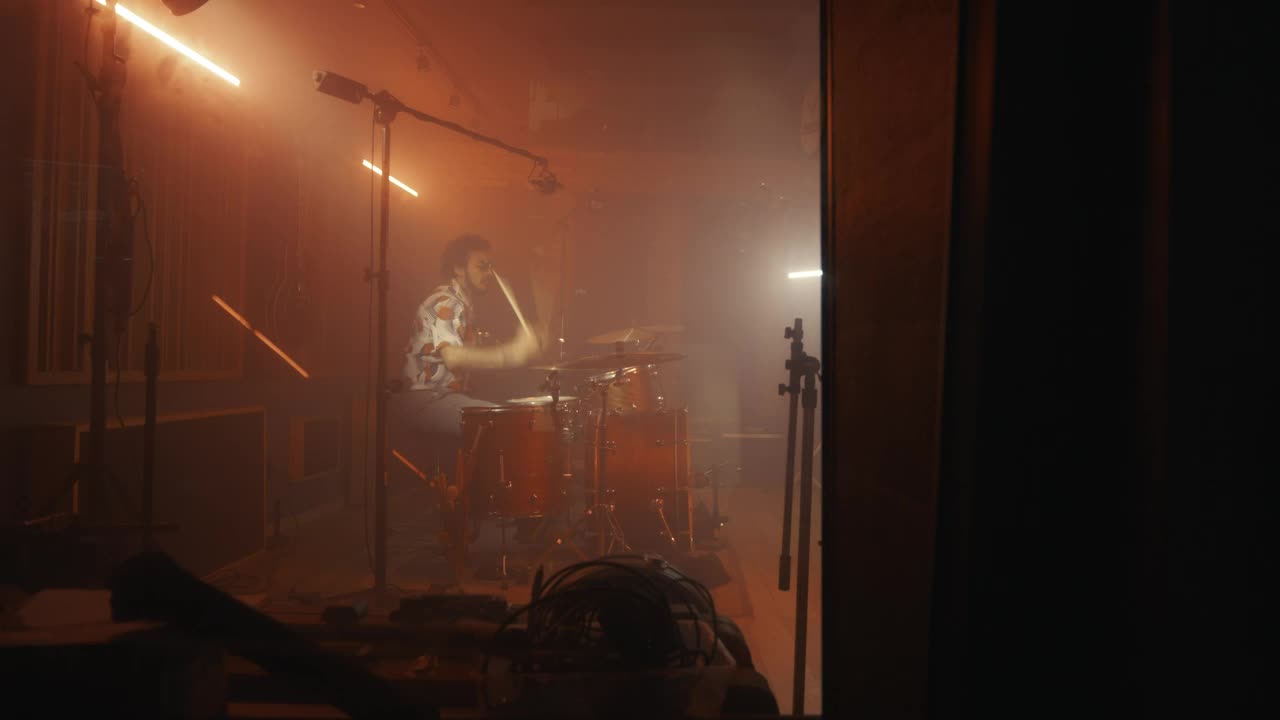 Stock Video Drummer Playing In A Studio Full Of Instruments Live Wallpaper For PC