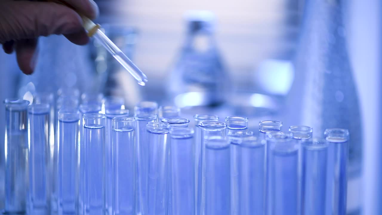 Stock Video Dropping Water On Laboratory Tubes Live Wallpaper For PC