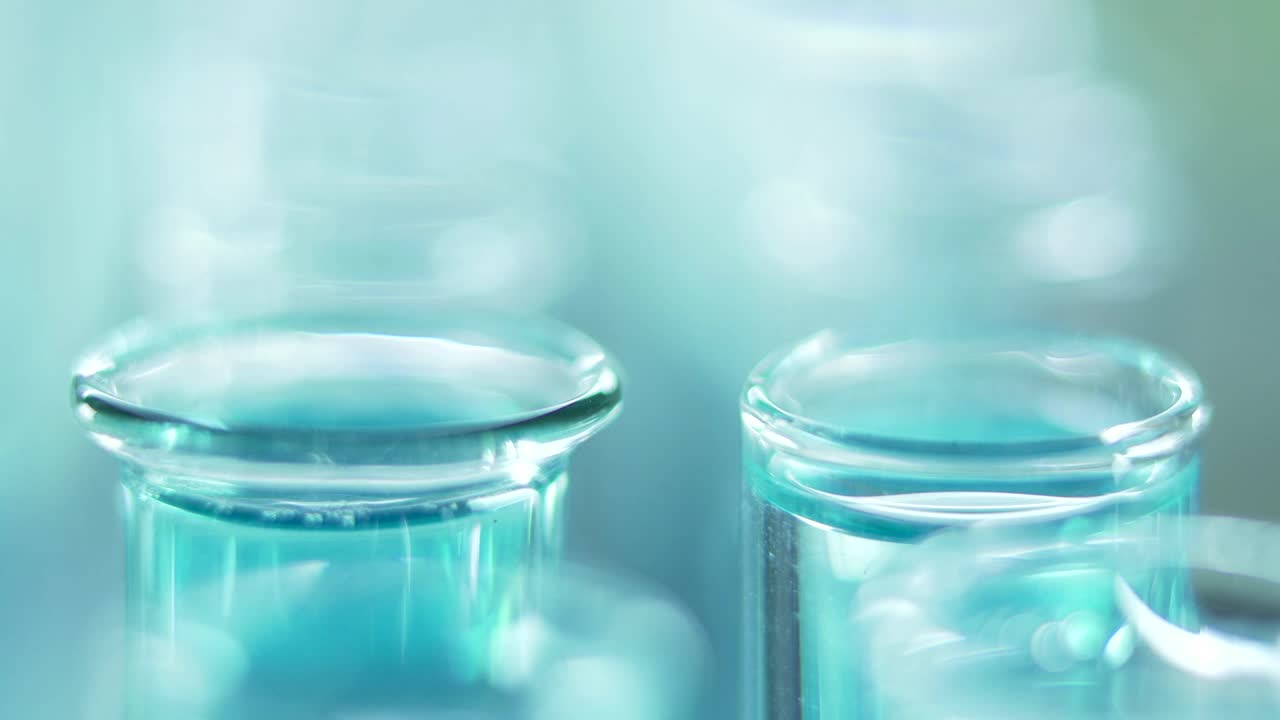 Stock Video Dropping Water On A Laboratory Tube Live Wallpaper For PC
