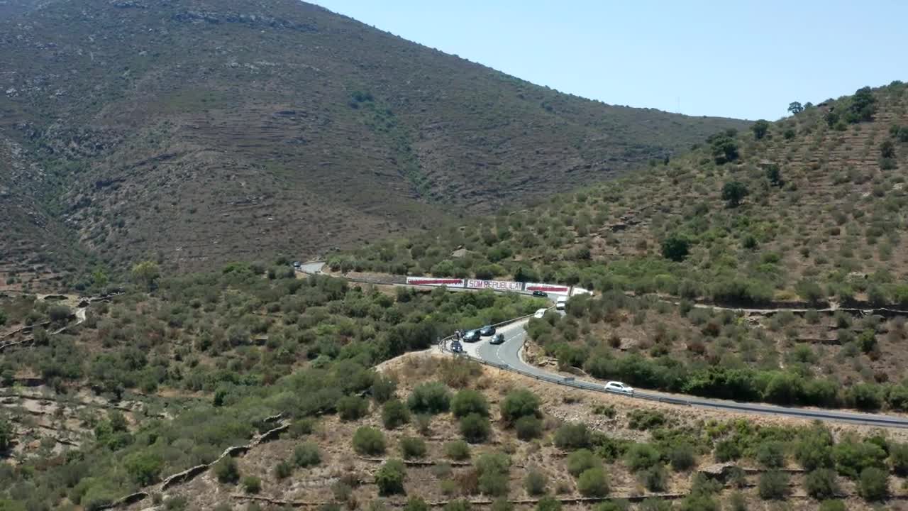 Stock Video Drone Flying Along A Winding Road In The Hills Live Wallpaper For PC