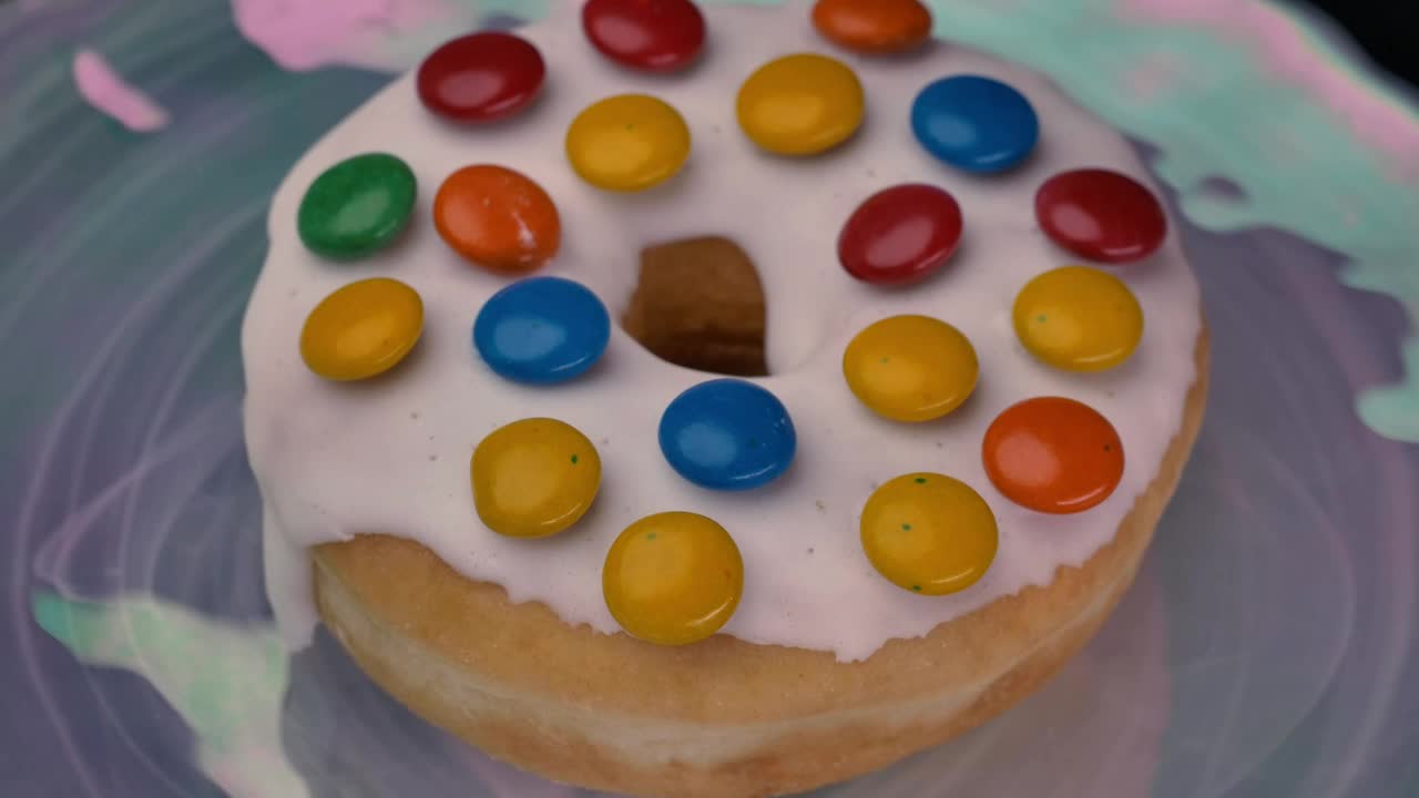 Stock Video Donut With White Frosting And Colored Chocolates Live Wallpaper For PC