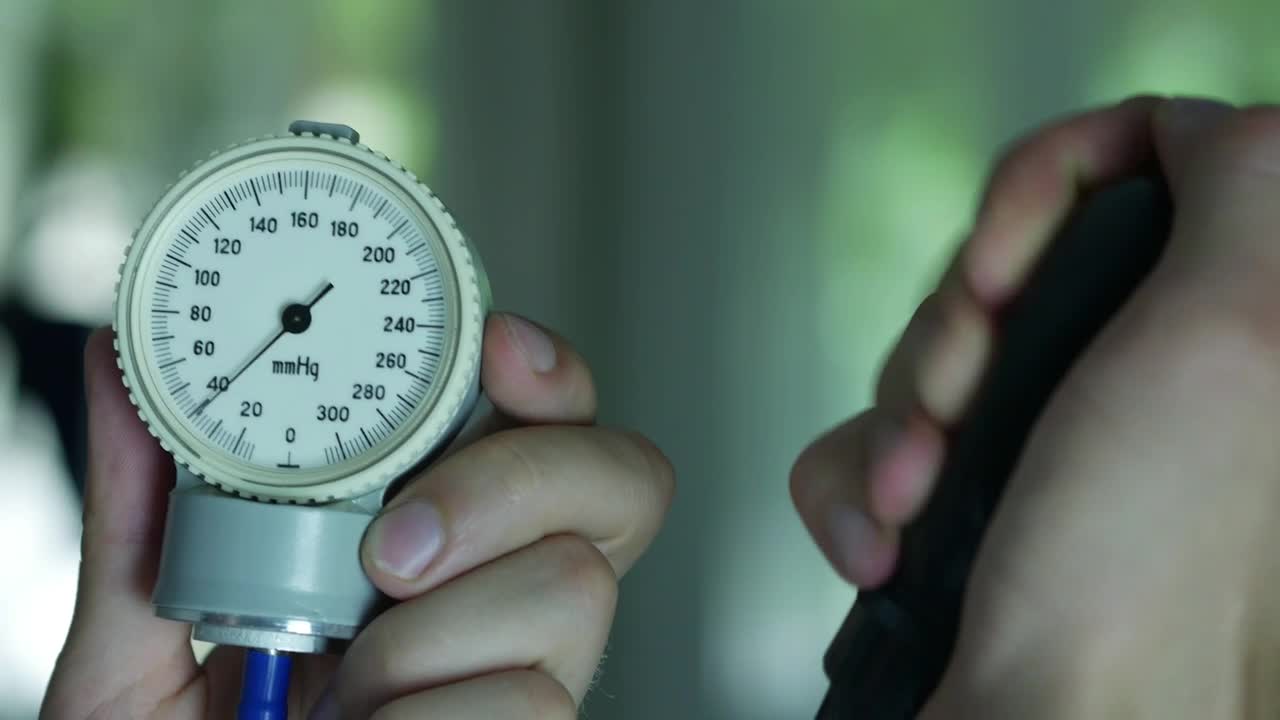 Stock Video Doctors Hands Measuring The Pressure Live Wallpaper For PC