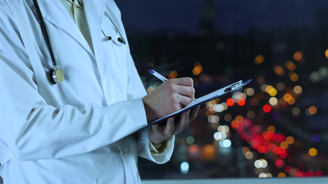 Stock Video Doctor Writing A Prescription With An Unfocused Street Background Live Wallpaper For PC