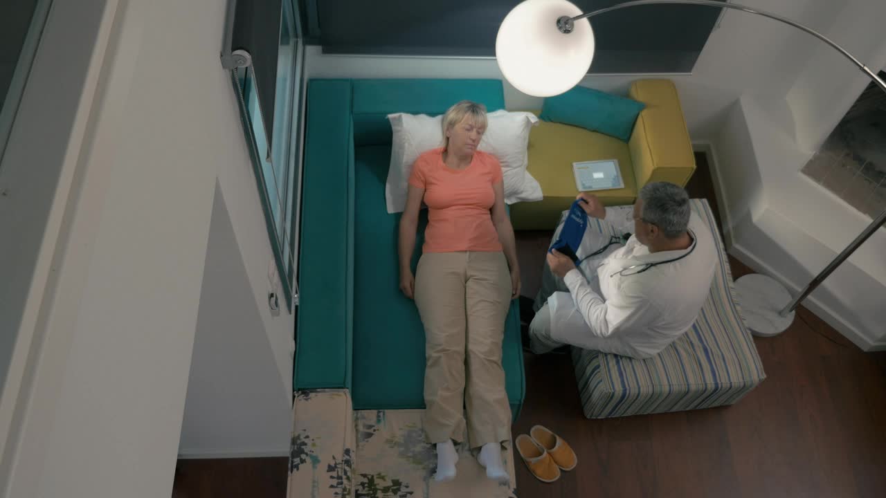 Stock Video Doctor Visiting A Woman At Home Live Wallpaper For PC