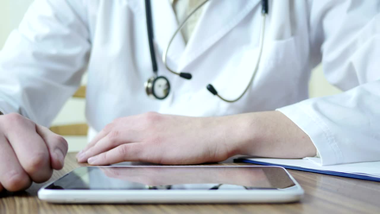 Stock Video Doctor Using A Tablet Device Live Wallpaper For PC