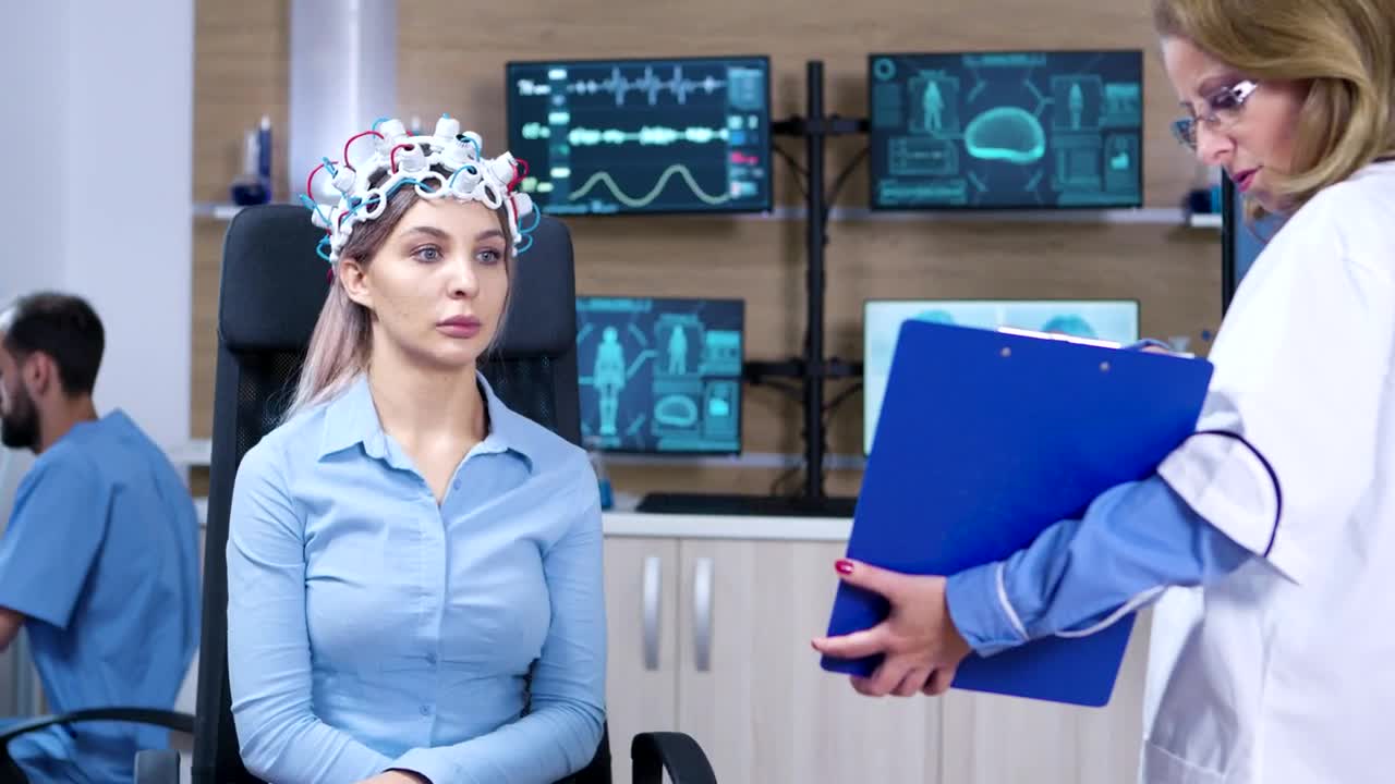 Stock Video Doctor Shows Results Of Brain Scan To Patient Live Wallpaper For PC