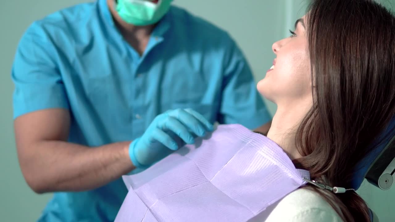 Stock Video Doctor Prepares Patient For Exam With Face Mask Live Wallpaper For PC