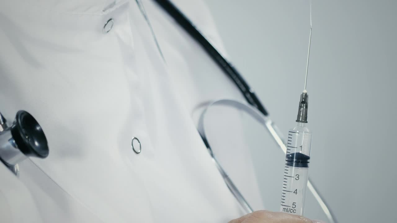 Stock Video Doctor Holding A Syringe Live Wallpaper For PC
