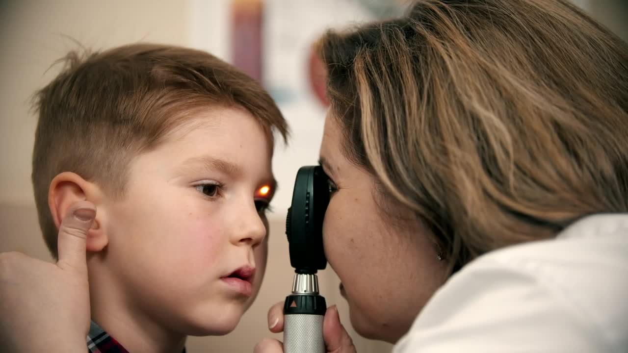 Stock Video Doctor Checking A Boy Vision With A Device Live Wallpaper For PC